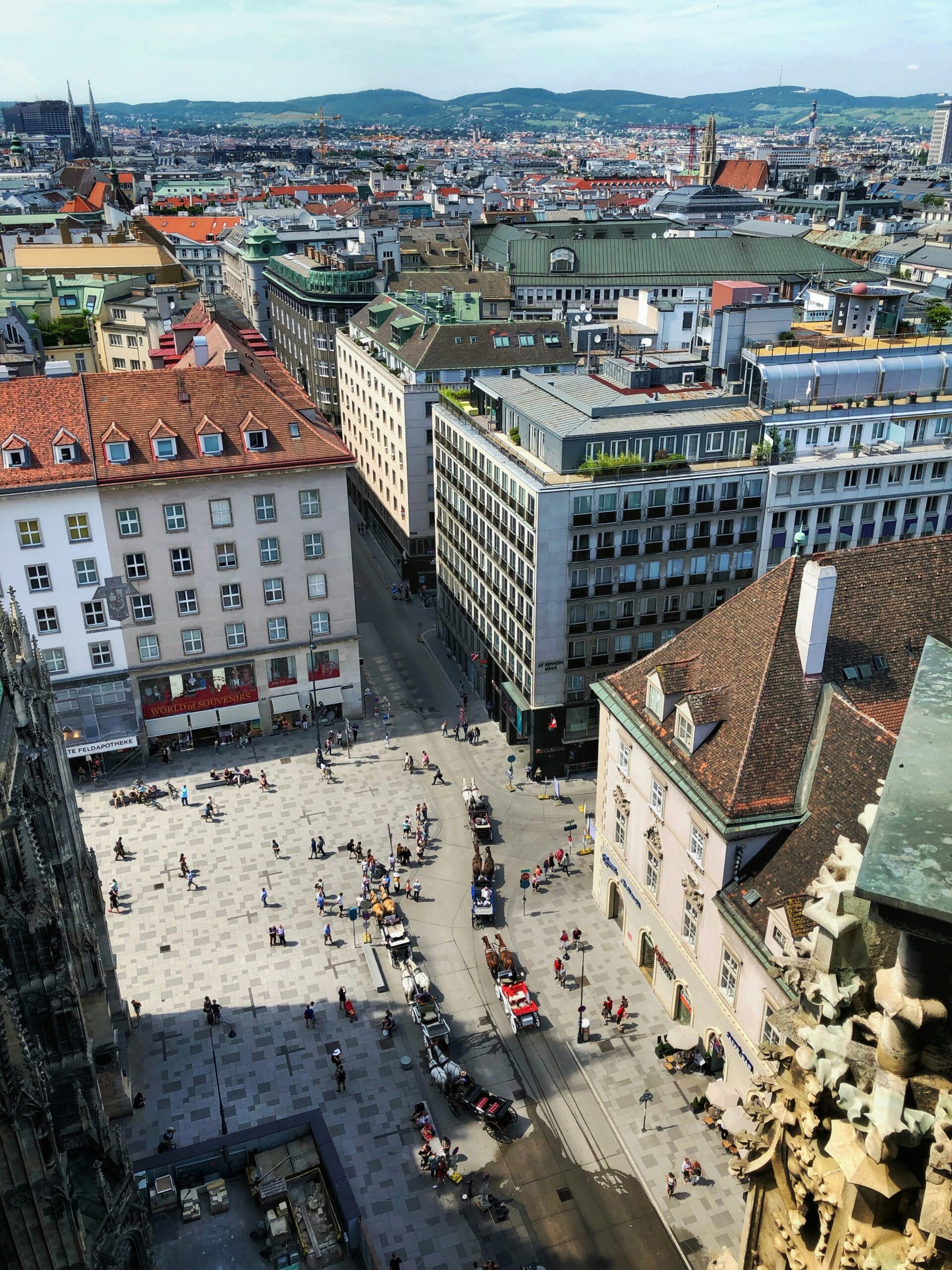 people on street beside buildings